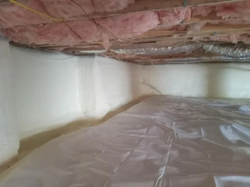Crawl space encapsulation with closed-cell spray foam for Commercial Roof Restoration in St. Marys